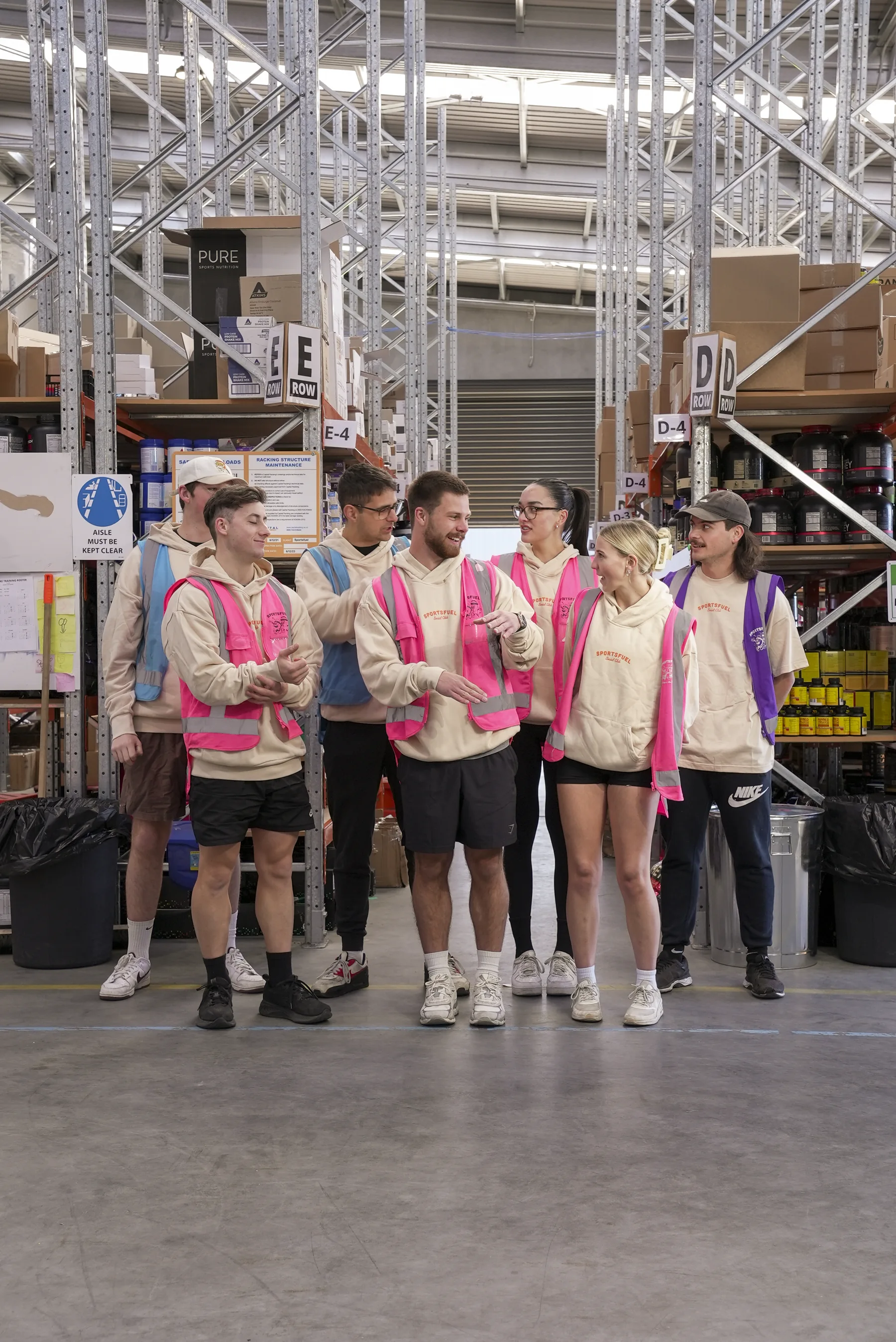 Sportsfuel team members together in the warehouse